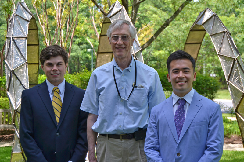 2015 SPS Mather Policy Interns Drew Roberts (l) and Elias Kim (r) with Nobel laureate John Mather (c).