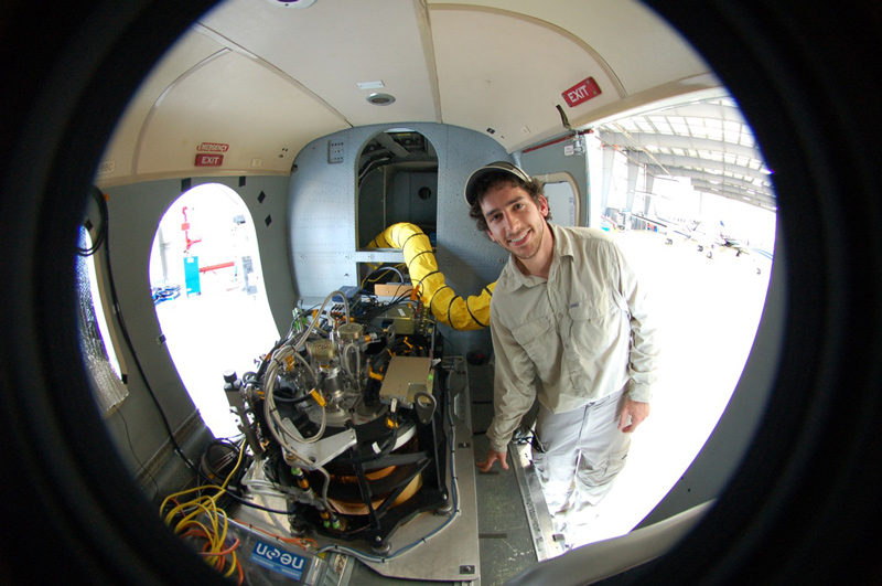 David Kelbe In the fuselage of NEON's (National Ecological Observatory Network) airborne imaging spectrometer. A spectrometer and waveform lidar (shown) are mounted to look out of a hole in the bottom of the aircraft. Photo courtesy of David Kelbe.