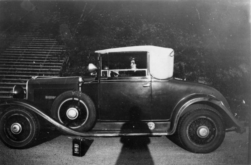 Melba Phillips sits at the wheel of Robert Oppenheimer’s car, which appears to be a 1929 Chrysler convertible coupe. The photographer must have been Robert, as he and Melba would go out to dinner together. Photo courtesy of AIP Emilio Segrè Visual Archives.