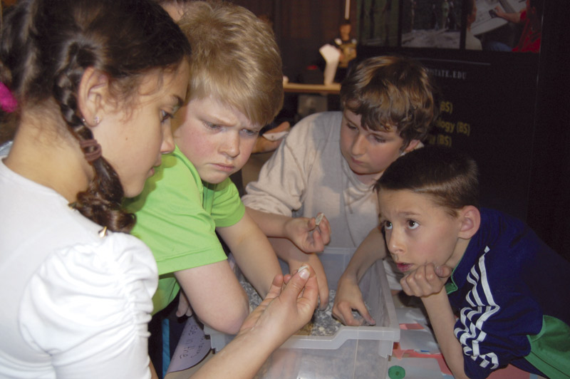 Our Expo is a multidisciplinary event. Here, students identify small fossils. Photo courtesy of Appalachian State University.