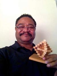 McNeary poses with one of his favorite puzzles. Photo courtesy of Michael McNeary.