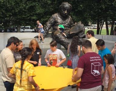 The first shift of SPS interns doing an outreach activity at the Einstein Memorial