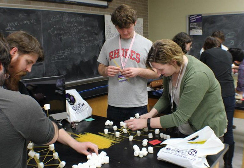 Students participate in a spaghetti tower engineering design contest.