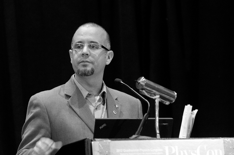 Sigma Pi Sigma president William DeGraffenreid opens the 2012 Quadrennial Physics Congress in Orlando, FL. Photo by Ken Cole.