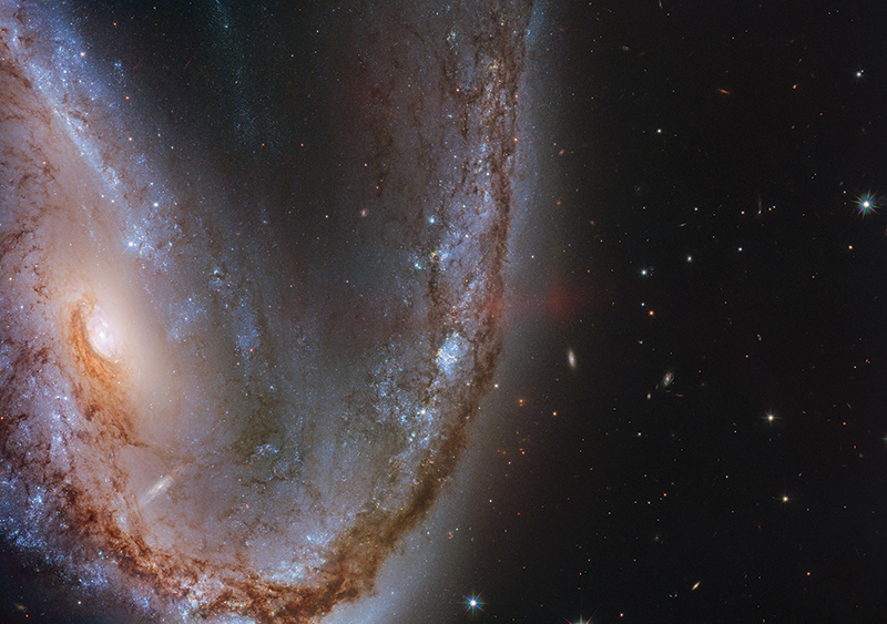 Galaxy NGC 2442 imaged by the Hubble Space Telescope. Photo courtesy of  ESA/Hubble &amp; NASA, S. Smartt et al.