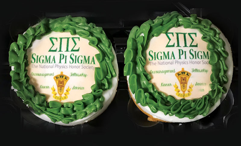 Texas Lutheran University shows off their Sigma Pi Sigma induction ceremony cupcakes, a change from their normal cake due to COVID protocols! Photo courtsey of Michelle Arguellez and Toni Sauncy, and cupcakes courtesy of Sweet Fountainz, Victoria, TX.