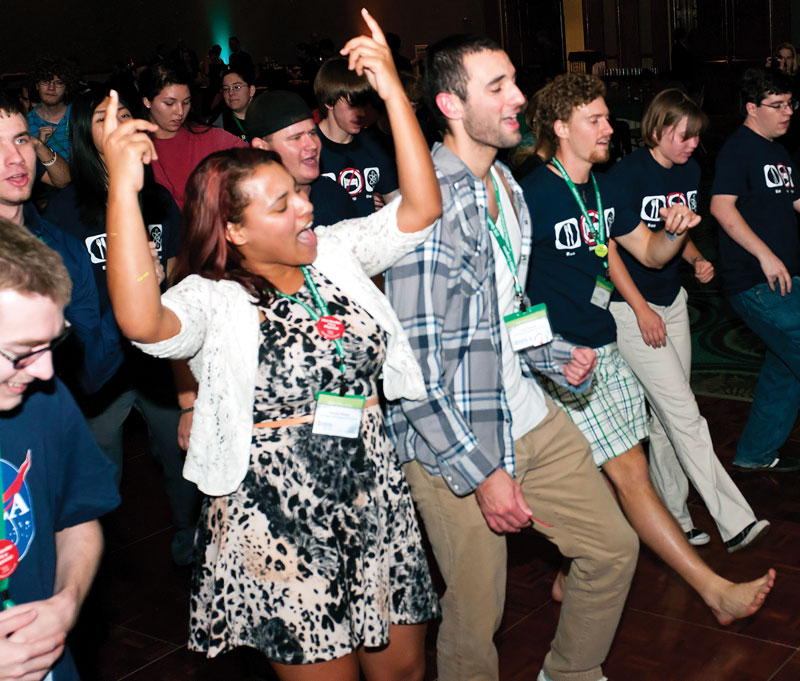 Physics students dance at the 2012 PhysCon “Club Congress” event. Photo by Ken Cole.