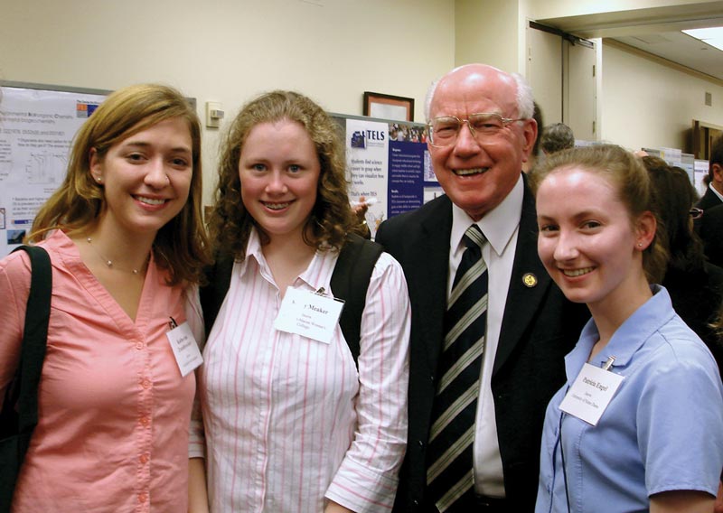 Patricia Engel (right) at the CNSF exhibition on Capitol Hill with, left to right, 2006 SPS interns Katherine Zaunbrecher and Kacey Meaker and Congressman Vernon Ehlers. Photo by Liz Dart Caron. 