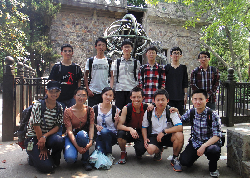 SPS members at Southeast University in Guangzhou, China, outside an observatory with an ancient Chinese astronomy instrument in the back. Photo courtesy of Zhi-Yong Zhou.