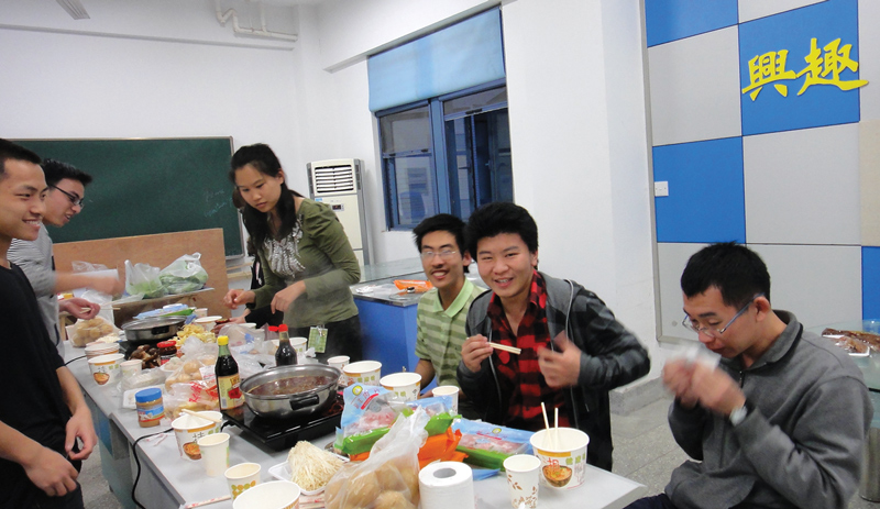 Southeast University's 2012 SPS &quot;Hot Pot&quot; party, with food similar to fondu. Photo courtesy of   Zhi-Yong Zhou.