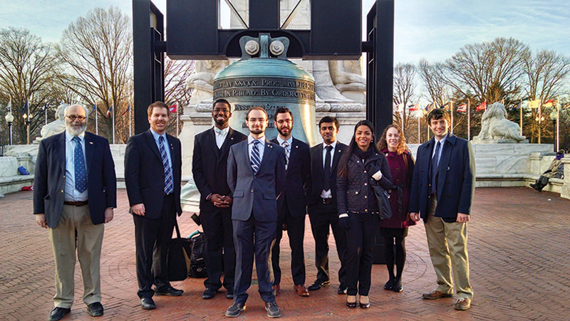 Amandeep Gill (third from right) poses with the SPS delegation on Capitol Hill. Photo by Courtney Lemon. 