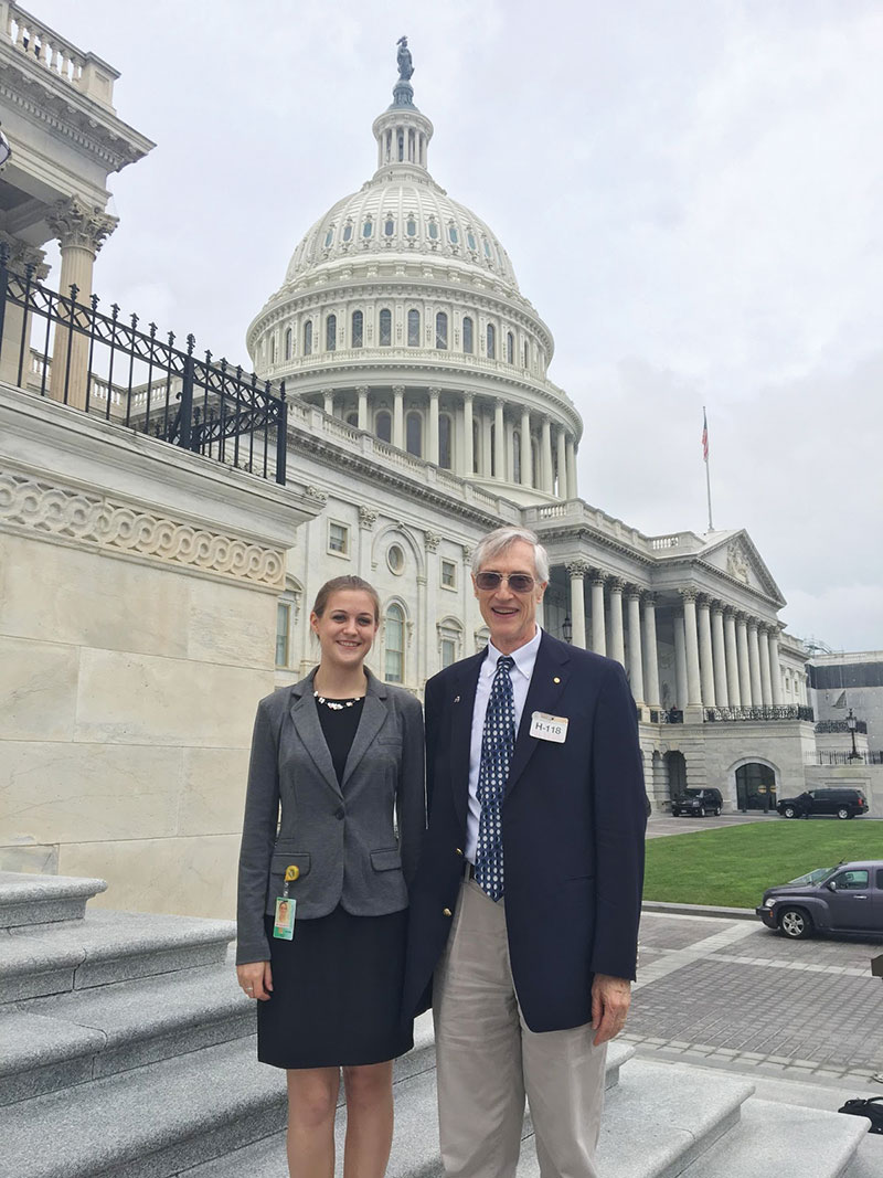Eleanor stands with Dr. John Mather in front of the Capitol. Dr. Mather sponsors the AIP Mather Internship. Photo by Riley Troyer.