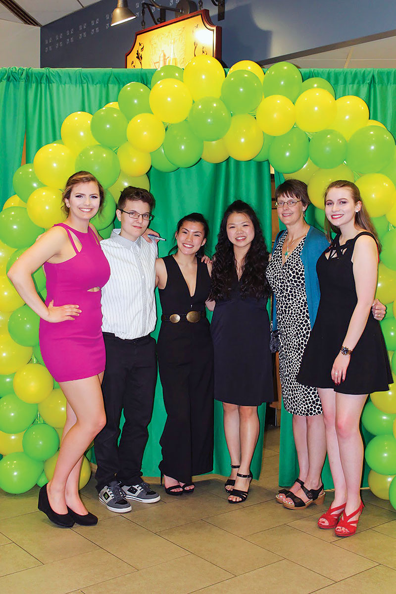  The Siena College SPS officers and advisor Dr. Michele McColgan at last year’s physics and computer science formal. The balloon arch was assembled by several chapter members.  