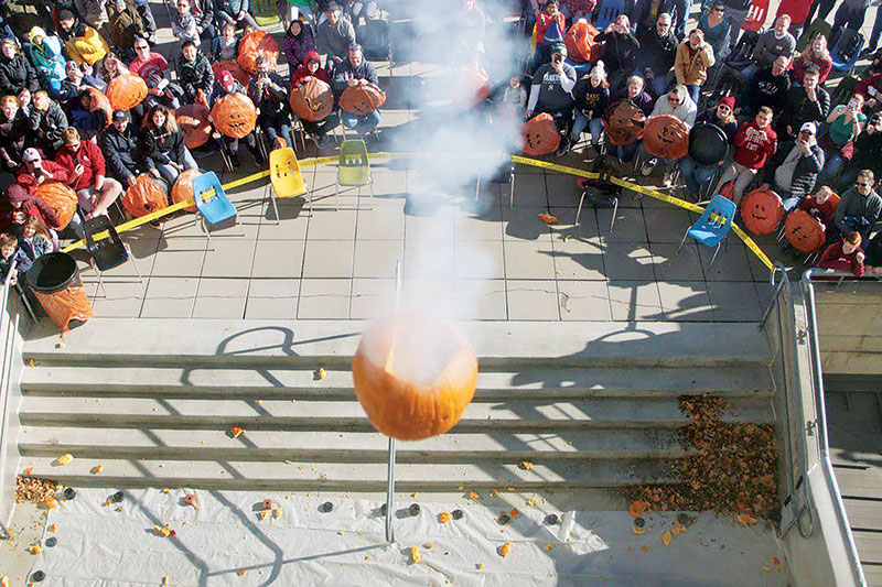 A liquid-nitrogen-filled pumpkin falls 12 stories in celebration of the hundred-year anniversary of physics and astronomy at Washington State University. Photo by Kai Eiselein of Moscow-Pullman Daily News. 