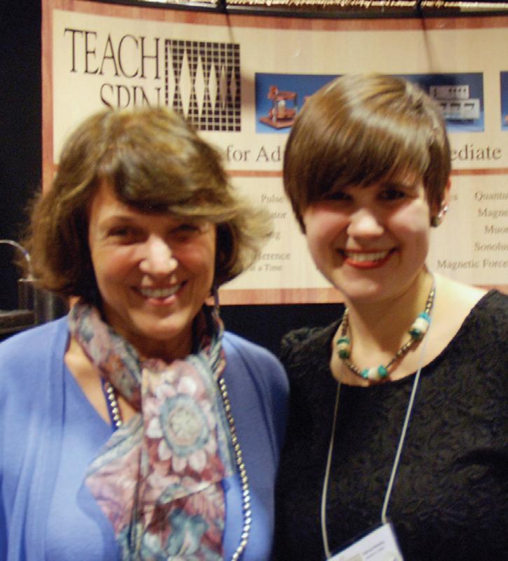 Amelia Plunk (right) poses with Barbara Wolff-Reichert in front of TeachSpin’s booth at the vendor fair. Photo by Jonathan Reichert.