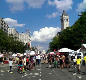 A view of the barbeque festival with the Capitol Building in the background.