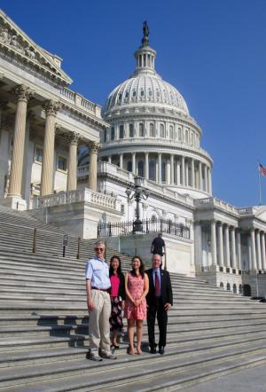 John Mather, SPS interns Katherine Stankus and Nikki Sanford, and Rep. Bill Foster (left-to-right) stand on the steps of the United States Capitol. Photo courtesy of Katherine Stankus.