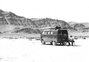 The author is shown sitting behind a 1964 VW Volkswagen bus in Sevier Lake (a salt flat) in western Utah, during a summer in his graduate school years. Out here peace of mind could be found. Why he did not do this more often back then he does not understand now. Photo by Douglas Strickland.