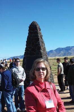 Mary beth monroe is pictured above at Trinity Site in New Mexico during the 2004 Quadrennial Congress of Sigma Pi Sigma. Photo by Tracy Nolis-Schwab.