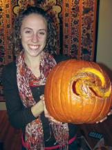 The author, Mary Chessey carves pumpkins at a WiPS event. Photo courtesy of Robyn Smith.