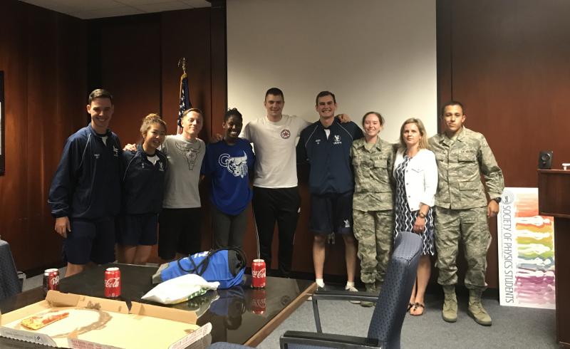 Students from the USAFA SPS chapter pose with Gearba-Sell during a meeting. Photos courtesy of Alina Gearba-Sell.