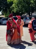 Aaron and Malwinder greeting Malwinder's parents before the wedding