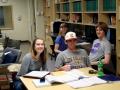 Students Nichol Johnson, Hannah Bode, Jacob Schletztbaum, and Miles Faaborg in the new Coe College Peterson Hall Physics Lounge. Photo courtesy of Steve Feller.