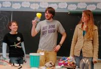 College of Wooster Physics Club members entertain elementary school children with physics demos.
